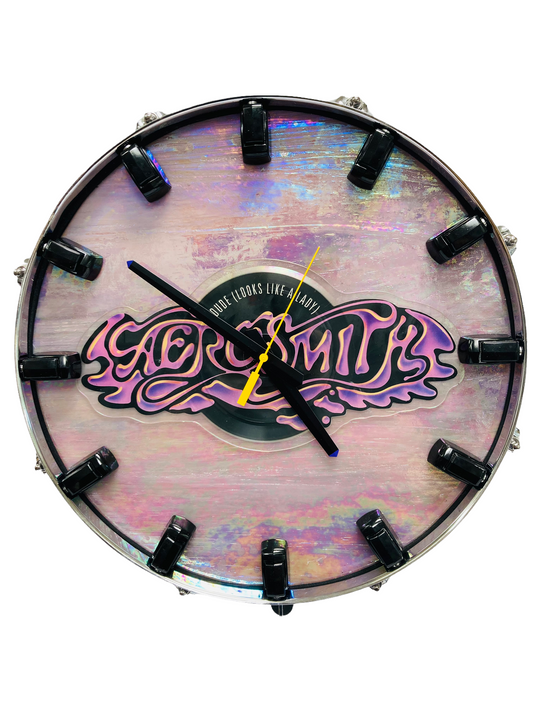 Aerosmith Snare Drum Picture Disc Wall Clock
14” diam. Battery operated.